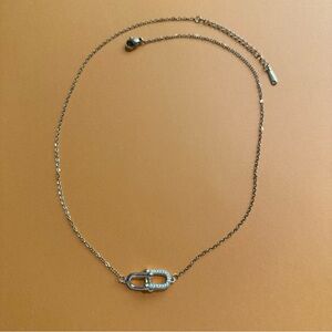 Cute gold tone half rhinestone heart link necklace.